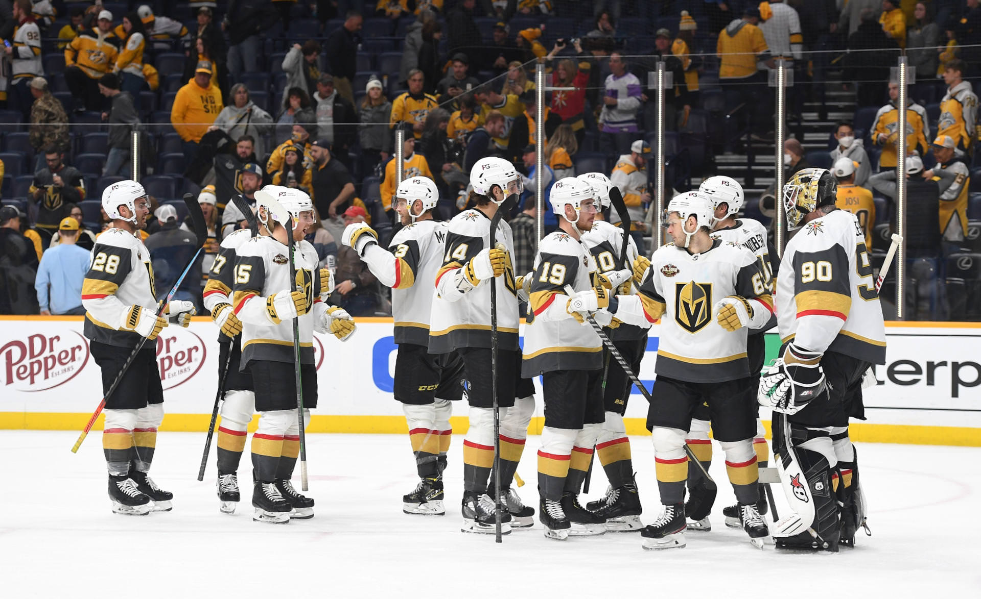 Vegas Golden Knights players celebrate after a win against the Nashville Predators