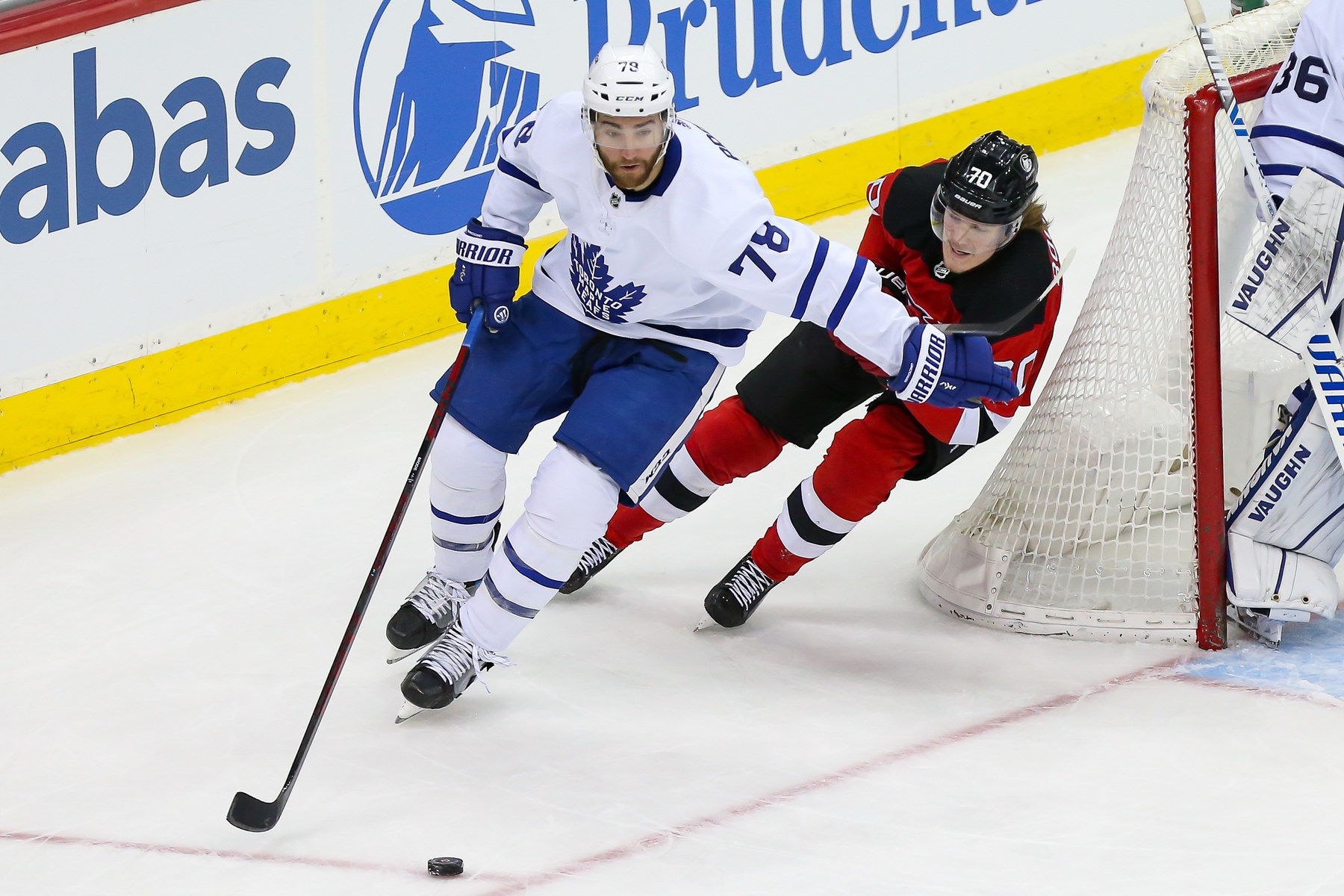Toronto Maple Leafs defenseman TJ Brodie (78) skates with the puck past New Jersey Devils center Jesper Boqvist (70)